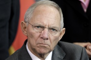 German Finance Minister Wolfgang Schaeuble attends a joint news conference with Chancellor Angela Merkel on the upcoming G-20 summit at the Chancellery in Berlin, Germany, Wednesday, Nov. 10, 2010. (AP Photo/Michael Sohn)