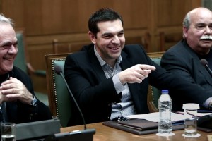 Greek Prime Minister Alexis Tsipras (C) attends a cabinet meeting in the Greek parliament in Athens on March 29, 2015. AFP PHOTO/ ANGELOS TZORTZINIS        (Photo credit should read ANGELOS TZORTZINIS/AFP/Getty Images)