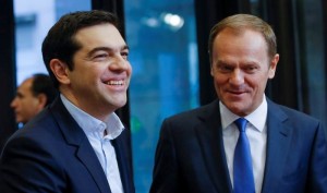 epa04603155 President of the European Council, Polish, Donald Tusk (R) welcomes Greek Prime Minister Alexis Tsipras prior to a meeting at EU council  headquarters in Brussels, Belgium, 04 February 2015.  EPA/OLIVIER HOSLET