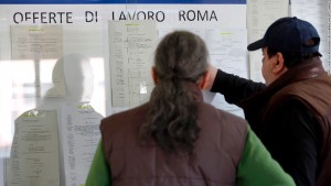 Jobseekers browse job notices displayed on a board inside an employment center in Rome, Italy, on Tuesday, Feb. 28, 2012. Italian business confidence unexpectedly fell to a two-year low in February after the economy entered its fourth recession since 2001 under the weight of austerity measures to fight the sovereign debt crisis. Photographer: Alessia Pierdomenico/Bloomberg via Getty Images