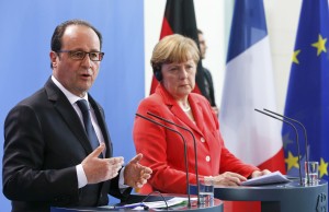 French President Francois Hollande and German Chancellor Angela Merkel address a news conference at the Chancellery in Berlin, Germany, May 19, 2015.     REUTERS/Fabrizio Bensch