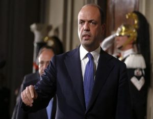 Italy's Interior Minister and leader of New Center Right party Angelino Alfano arrives to talk to reporters at the end of the consultations with Italian President Giorgio Napolitano at the Quirinale Palace in Rome February 15, 2014. Italy's president may ask young center-left leader Matteo Renzi to become its youngest ever prime minister this weekend after a party coup that forced Enrico Letta to resign as premier of the euro zone state struggling to pull out of recession. REUTERS/Tony Gentile (ITALY - Tags: POLITICS)