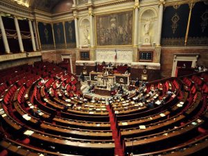 The French parliament debate to ban women from wearing full Islamic veils in public.