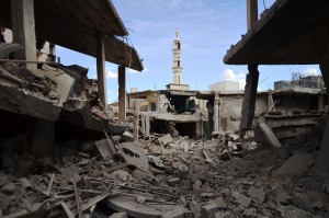 A picture taken on September 30, 2015 shows damaged buildings and a minaret in the central Syrian town of Talbisseh in the Homs province. Russian warplanes carried out air strikes in three Syrian provinces, including Homs, along with regime aircraft on September 30, according to a Syrian security source. Earlier in the day, the Syrian Observatory for Human Rights, a Britain-based monitor, reported at least 27 civilians had been killed in air strikes in the Homs province, adding that the strikes hit Rastan, Talbisseh and Zaafarani. The other Syrian security source said the Russian strikes had hit Rastan and Talbisseh in the province of Homs. AFP PHOTO / MAHMOUD TAHA        (Photo credit should read MAHMOUD TAHA/AFP/Getty Images)