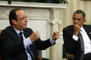 U.S. President Barack Obama looks at French President Francois Hollande as they meet in the Oval Office of the White House in Washington May 18, 2012. Hollande is in the United States to join other leaders of the major industrial economies and meet for a G8 Summit at Camp David this weekend to try to head off a full-blown financial crisis in Europe.     REUTERS/Larry Downing    (UNITED STATES - Tags: POLITICS BUSINESS)