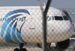 FILE - In this Tuesday, March 29, 2016, file photo, the hijacked aircraft of Egyptair after landing at Larnaca airport, Cyprus.  A similar Airbus A320 EgyptAir plane from Paris to Cairo carrying 66 people disappeared from radar early Thursday morning, the airline said. EgyptAir Flight 804 was lost from radar at 2:45 a.m. local time when it was flying at 37,000 feet, the airline said. It said the Airbus A320 had vanished 10 miles (16 kilometers) after it entered Egyptian airspace. (AP Photo/Petros Karadjias, File)