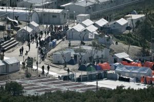 epa05244790 A general view over the hotspot refugee camp, formerly a detention centre, in Moria, Lesvos island, Greece, 05 April 2016. Migrants who refuse to apply for asylum are to be deported to Turkey, in accordance with a tit-for-tat agreement between European Union and Turkey on the refugee and migration crisis. EPA/ORESTIS PANAGIOTOU