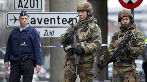 Belgian troops and police control a road leading to Zaventem airport following Tuesday's airport bombings in Brussels