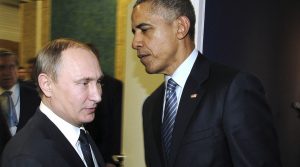 Russian President Vladimir Putin shakes hands with U.S. President Barack Obama as they attend the World Climate Change Conference 2015 (COP21) at Le Bourget, near Paris